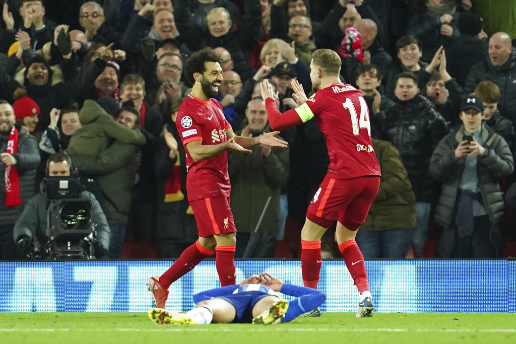 Liverpool's Mohamed Salah, left, celebrates after scoring his side's second goal with Liverpool's Jordan Henderson