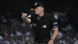 how much do MLB umpires earn