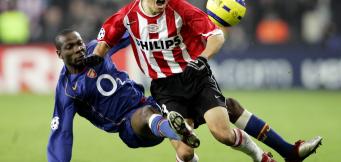 Arsenal defender Lauren with a tough tackle