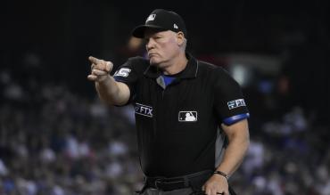 how much do MLB umpires earn